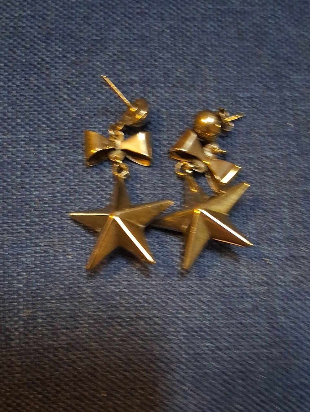 Silver Star Drop Earrings with Bow Accent